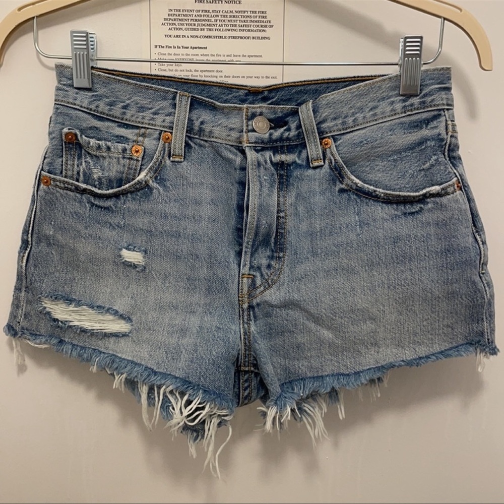 Levi’s High Rise Distressed Denim Shorts